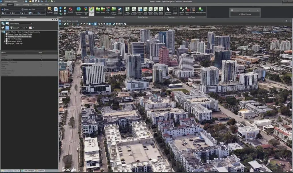 Màn hình máy tính với hình ảnh 3D vệ tinh của thành phố cùng các tòa nhà, hiển thị trên phần mềm GIS – hỗ trợ tối ưu cho workflow CAD và tích hợp liền mạch trong MicroStation 2025.
