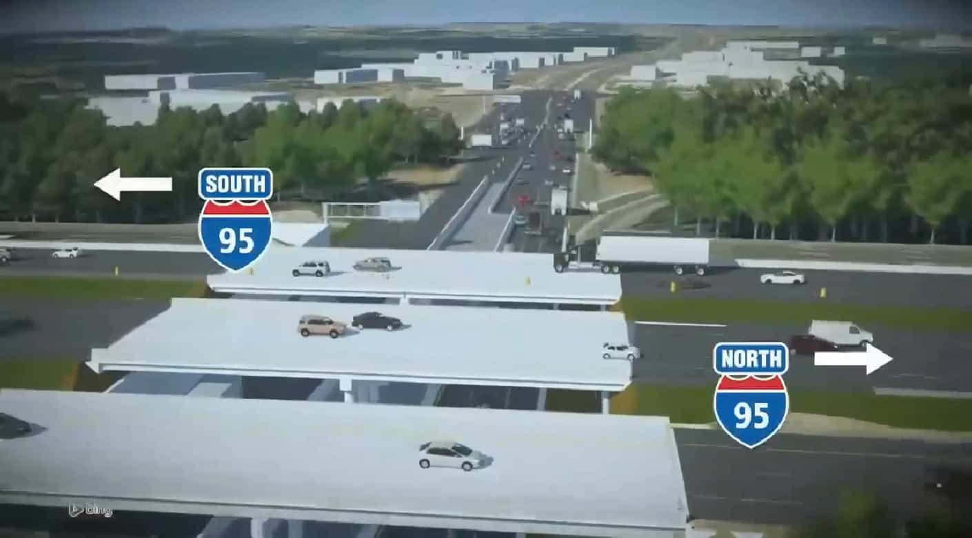 Mô phỏng 3D một cầu vượt trên đường cao tốc thuộc dự án I-95 Rappahannock River Crossing, với xe cộ lưu thông hai chiều, bảng chỉ dẫn I-95 South và I-95 North, phía sau là cây xanh và công trình xây dựng.