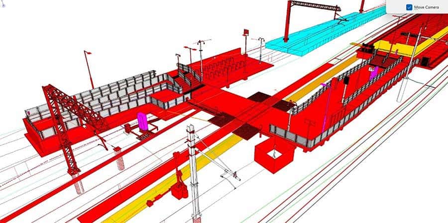 Mô hình 3D nhà ga với đường dây trên cao, các lối lên xuống, cầu đi bộ trong gam màu đỏ, xanh, vàng.